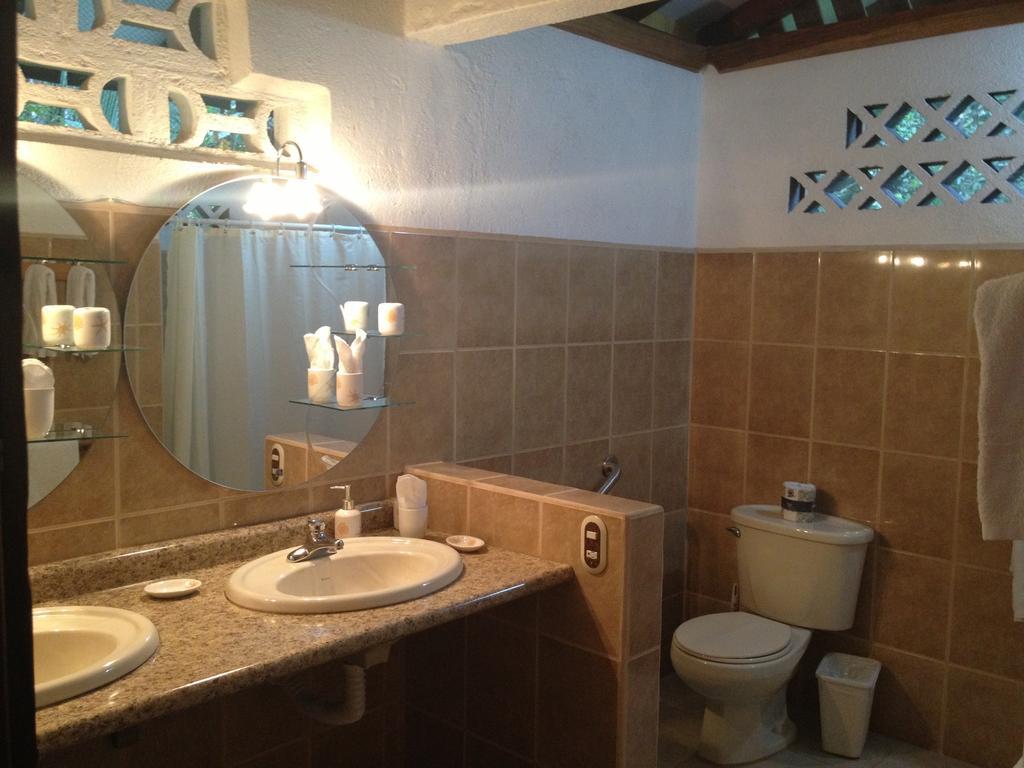 Hotel Suizo Loco Lodge & Resort Кауита Номер фото